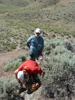 Darrell and student in the field