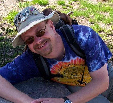 Randy Bechtel headshot hiking near Mt. Rainier